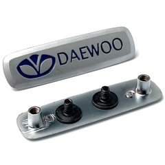 Купити Емблема шильдик Daewoo для автомобільних килимків Алюміній 1 шт 65670 Емблеми шильдики Підп'ятники для автокилимків