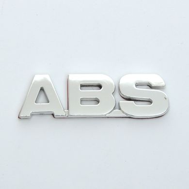 Купити Емблема - напис "ABS" скотч 94х28 мм (LOGO ABS) 22078 Емблема напис на іномарки