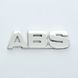 Купити Емблема - напис "ABS" скотч 94х28 мм (LOGO ABS) 22078 Емблема напис на іномарки - 1 фото из 2