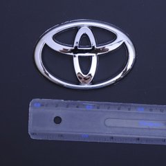 Купити Емблема "Toyota" 100х68мм пластик/Скотч (Польща) 21592 Емблеми на іномарки
