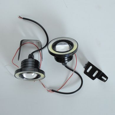 Купити Протитуманні LED Фари круглі / Лінза з ДХО D64 мм / 12V / 10W / 7000K / 2 шт 8746 Протитуманні фари LED з лінзою і світло-тіньової кордоном