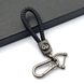 Купить Кожаный плетеный брелок Infiniti для авто ключей с карабином 54834 Брелки для автоключей - 1 фото из 2