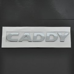 Купить Эмблема надпись Caddy наклонная скотч 171 x 25 мм 2011- (wiwo 2K5 853 687 739) 22198 Эмблема надпись на иномарки
