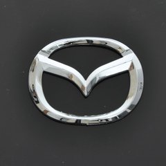 Купить Эмблема для Mazda 626 пластиковая 85 x 65 мм 21364 Эмблемы на иномарки