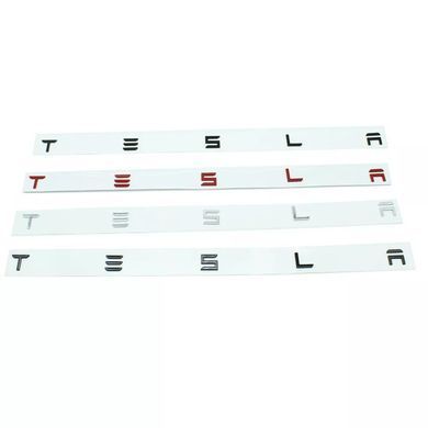 Купить Эмблема надпись Tesla матовая Черная Пластикна скотче (буквы) (Завод) 88387 Эмблема надпись на иномарки