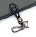 Купити Шкіряний плетений брелок Peugeot для авто ключів з карабіном 54837 Брелоки для автоключів - 1 фото из 2
