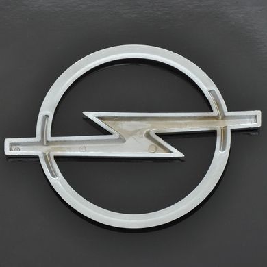 Купить Эмблема для Opel Vectra C / Combo ровная 100 x 131 мм пластиковая скотч 21369 Эмблемы на иномарки