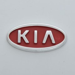 Купити Емблема Kia Sepia / Rio скотч 90х45 мм Червона 21529 Емблеми на іномарки