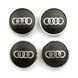 Купить Колпачки на литые диски Audi 60 x 55 мм объемный логотип Черные 4 шт 23013 Колпачки на титаны - 1 фото из 3