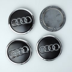 Купить Колпачки на литые диски Audi 69 х 57 мм / объемный логотип / кольцо / Черные 4 шт 23015 Колпачки на титаны с логотипами