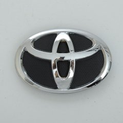 Купити Емблема, логотип Toyota Corolla 2009-2013, 140х95мм пластик, 6 пуклей, перед Туреччина 21375 Емблеми на іномарки