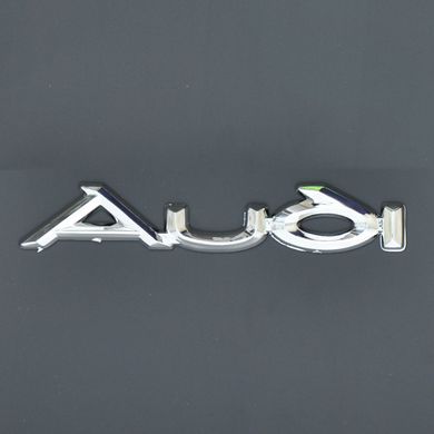 Купити Эмблема - надпись "Audi" новая 131х21мм 22259 Емблема напис на іномарки