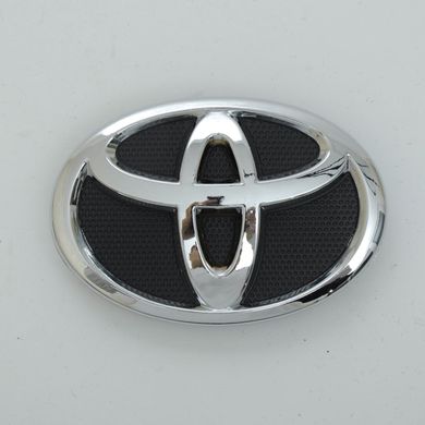 Купити Емблема, логотип Toyota Corolla 2009-2013, 140х95мм пластик, 6 пуклей, перед Туреччина 21375 Емблеми на іномарки