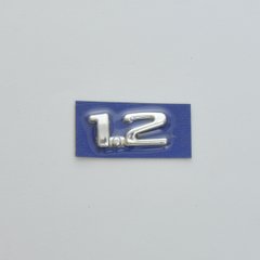 Купить Эмблема - надпись "1.2" (Corsa 1-2) скотч 40x18 мм 1996-2004 (5680) 22051 Эмблема надпись Иномарки