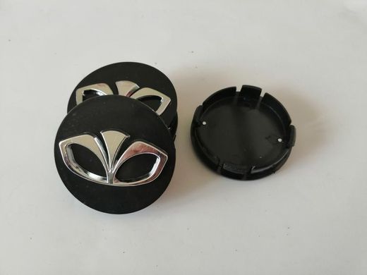 Купить Колпачки на литые диски Daewoo 60х55 мм /объемный логотип / Черные 4 шт 23019
