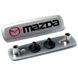Купити Емблема шильдик Mazda для автомобільних килимків Алюміній 1 шт 62259 Емблеми шильдики Підп'ятники для автокилимків - 1 фото из 5