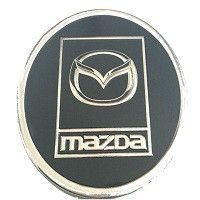Купити Наклейки на колпаки MAZDA (90мм) чорна 4 шт 23087 Наклейки на ковпаки
