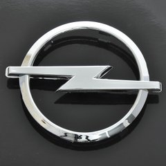 Купить Эмблема для Opel 115 x 145 мм пластиковая Xром скотч (Astra H Corsa D перед зад) 21566 Эмблемы на иномарки
