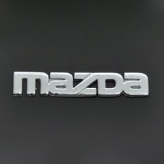 Купить Эмблема надпись Mazda малая скотч 90 x 15 мм 22106 Эмблема надпись на иномарки