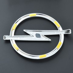 Купить Эмблема для Opel 135 x 164 мм пластиковая скотч Vectra C 2002-2008 перед 21568 Эмблемы на иномарки