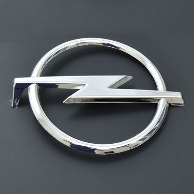 Купить Эмблема для Opel 135 x 164 мм пластиковая скотч Vectra C 2002-2008 перед 21568 Эмблемы на иномарки