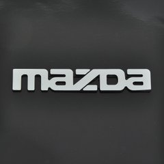 Купити Емблема - напис "MAZDA" (стара велика 323-626) скотч 155х25 мм 1991-1997 (5646) 22108 Емблема напис на іномарки