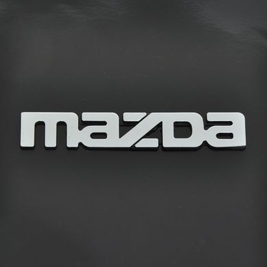 Купить Эмблема надпись Mazda старая большая 323-626 скотч 155 x 25 мм 1991-1997 (5646) 22108 Эмблема надпись на иномарки