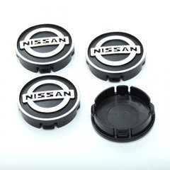 Купить Колпачки на литые диски Nissan 60х55 мм /объемный логотип / Черные 4 шт 23028 Колпачки на титаны с логотипами