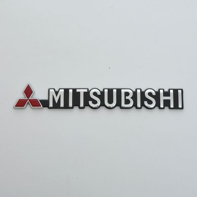 Купить Эмблема надпись Mitsubishi чорный фон скотч 190 x 23 мм 22111 Эмблема надпись на иномарки