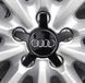 Купить Колпачки колеса на литые диски Audi 135 / 57 мм Пятиконечный объемный логотип Черные 1 шт 89920 Колпачки на титаны