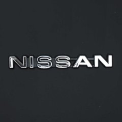 Купити Емблема - напис Nissan 162х21 мм скотч (Чорний ободок) 22113 Емблема напис на іномарки