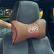 Buy Headrest pillow with Toyota logo Eco-leather 3D Color logo Brown-Brown piping 1 pc 91579 Pillows for the headrest - under the neck - 1 photos from 4