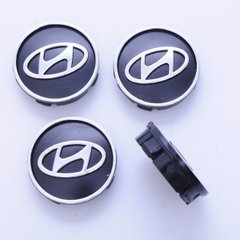 Купить Колпачки на литые диски Hyundai 60х55 мм / объемный логотип / Черные 4 шт 22930 Колпачки на титаны с логотипами